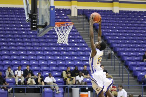 Cameron Grant goes for the dunk.