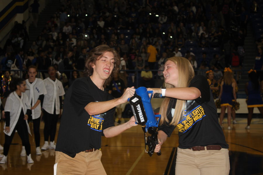 Corbin Hill and Allison Spence are getting ready to shoot Corsicanas new Turn on the lights its Friday night T shirts in the stands at the pep rally