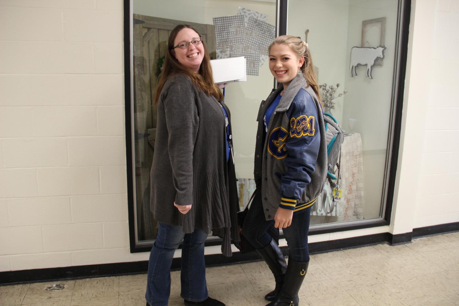 Mrs. Martin visits with Isabella Binford.